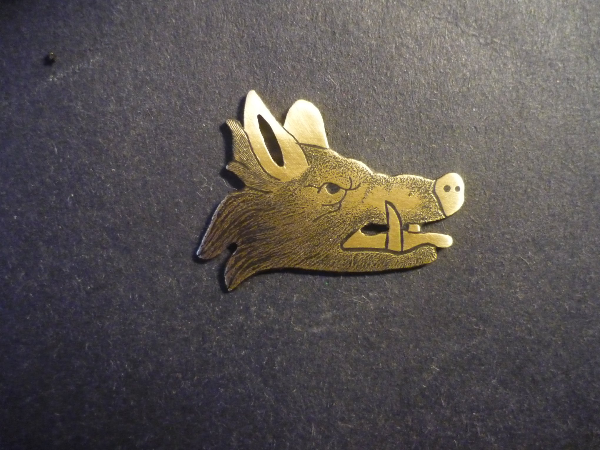 brass boar head engraving